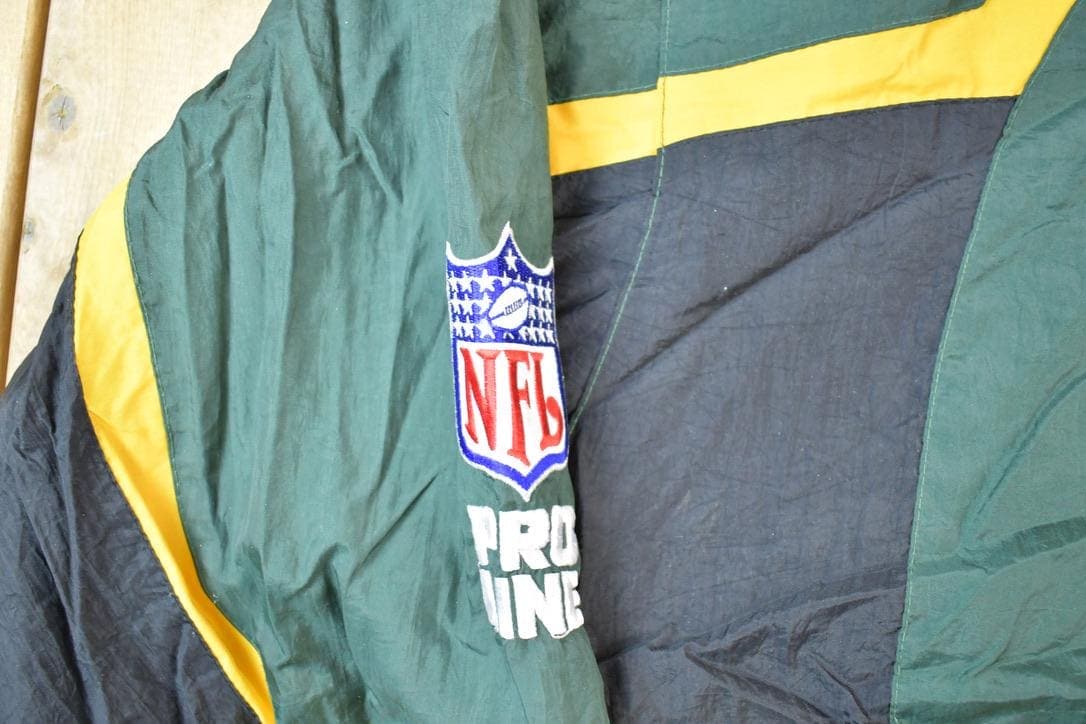 Vintage 1990s Green Bay Packers AOP Proline Logo Athletic NFL Football Warm Up Spring Jacket Men's Large from propervintagecanada