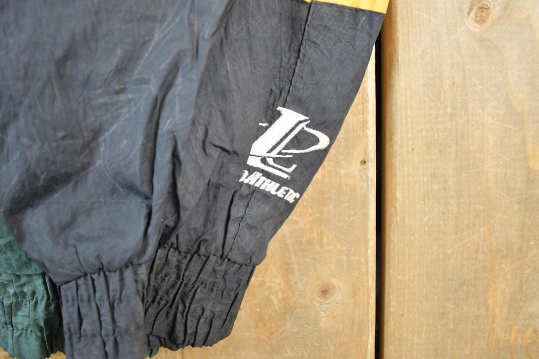 Vintage 1990s Green Bay Packers AOP Proline Logo Athletic NFL Football Warm Up Spring Jacket Men's Large from propervintagecanada