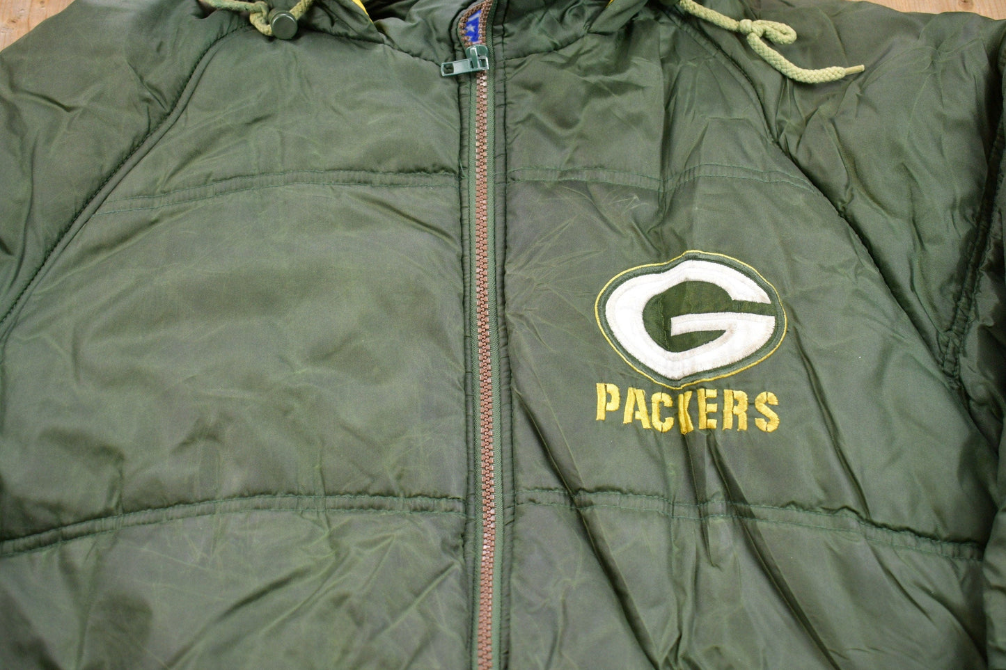 Vintage 1990s Green Bay Packers Game Day NFL Puffer Jacket Men's Large from propervintagecanada