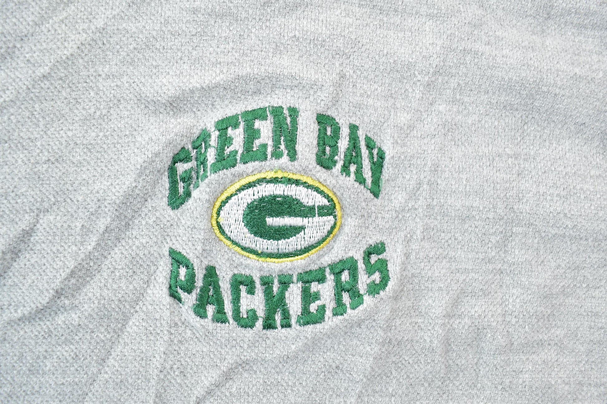 Vintage 1990s Green Bay Packers Heavy Knit NFL Graphic T-Shirt Men's Large from propervintagecanada