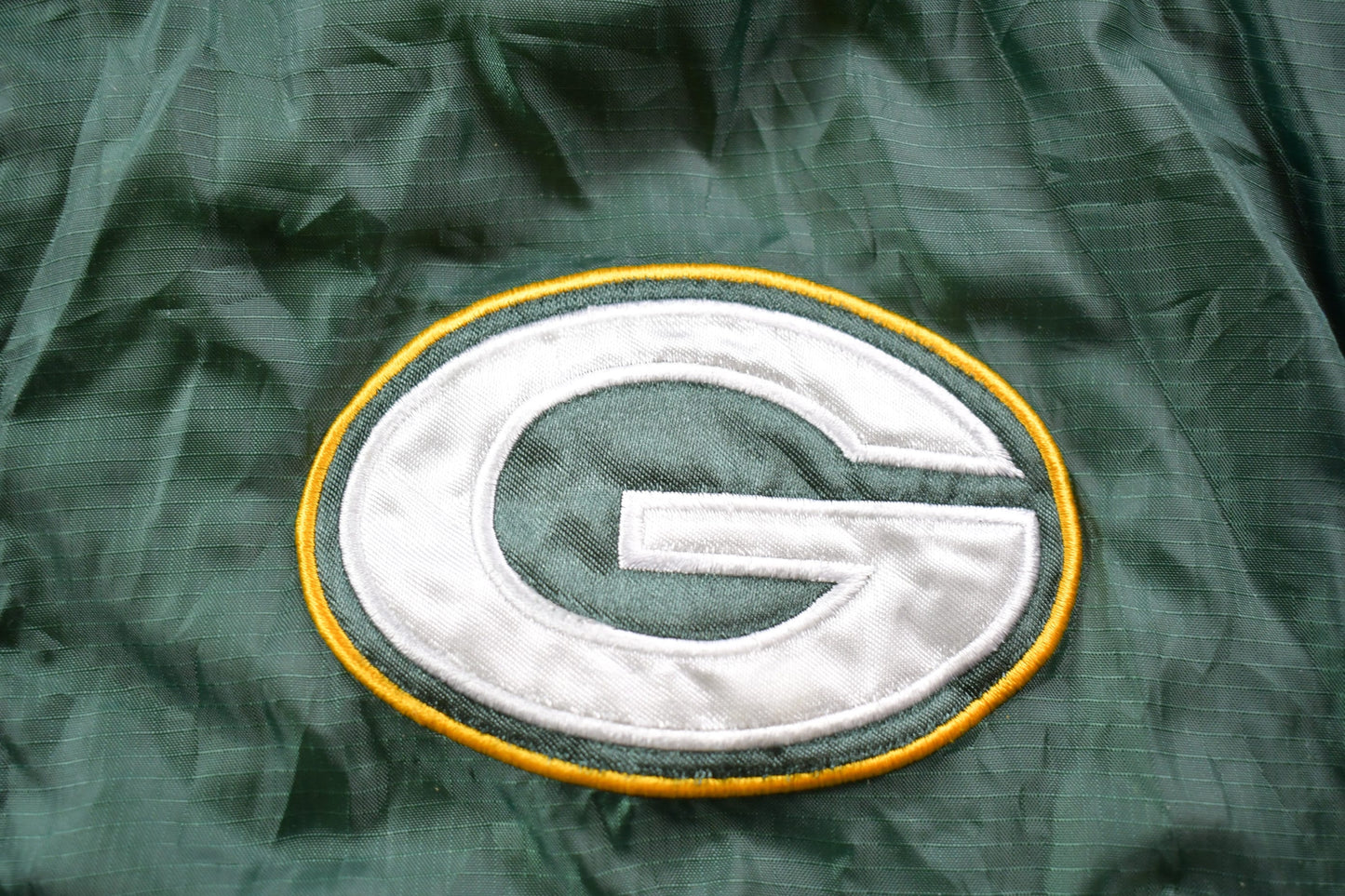 Vintage 1990s Green Bay Packers Logo Fleece Lined Convertible Jacket Men's Large from propervintagecanada