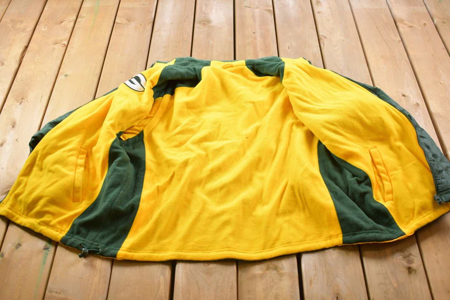 Vintage 1990s Green Bay Packers Logo Fleece Lined Convertible Jacket Men's Large from propervintagecanada