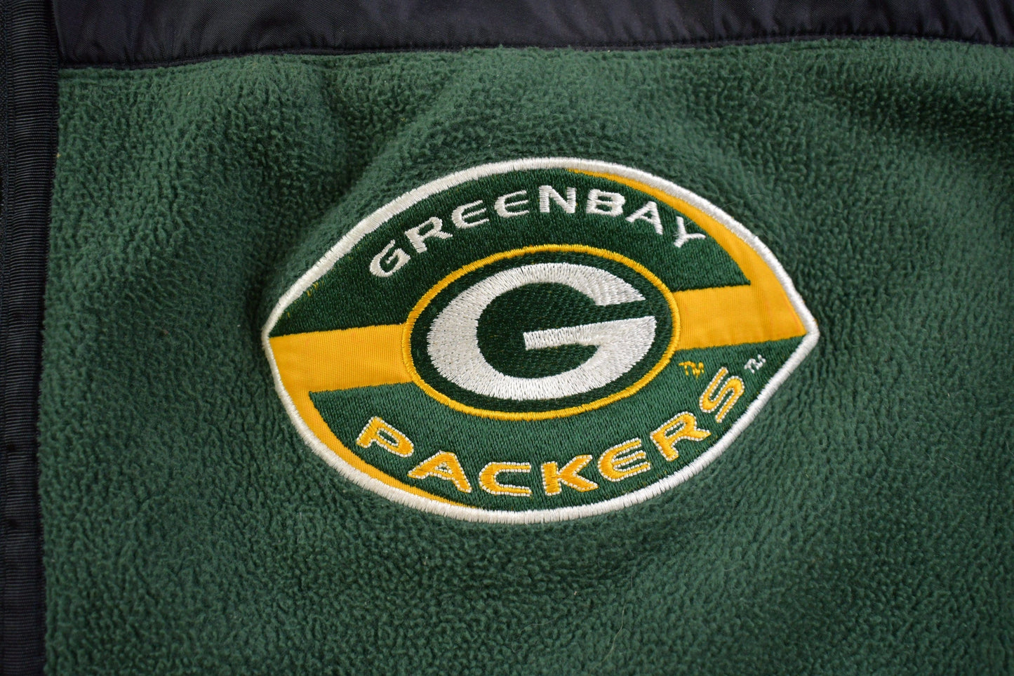 Vintage 1990s Green Bay Packers Mirage NFL Zip Fleece Jacket Men's 2XL from propervintagecanada