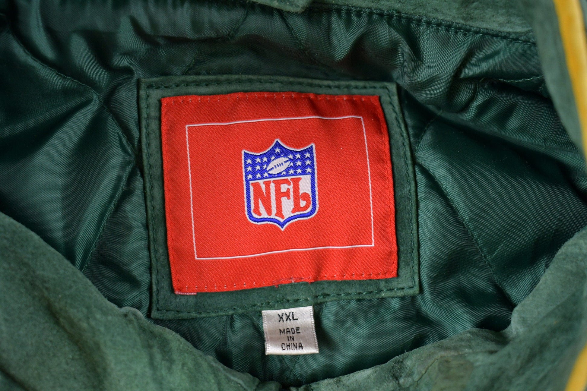 Vintage 1990s Green Bay Packers NFL Suede Full Zip Jacket Men's 2XL from propervintagecanada