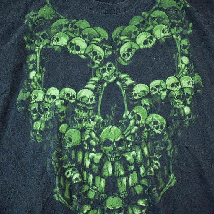 Vintage 1990s Green Skulls Goth Metal Souvenir Single Stitch Graphic Print T-Shirt Men's 2XL from propervintagecanada