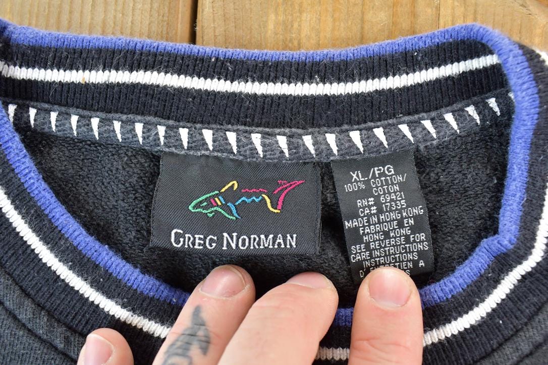 Vintage 1990s Greg Norman Shark logo Souvenir Crewneck Sweatshirt Men's XL from propervintagecanada
