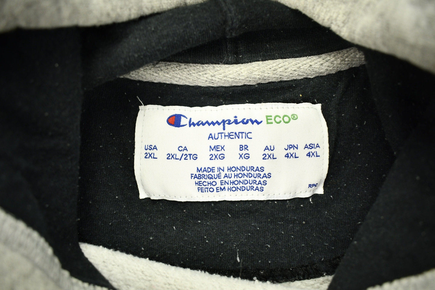 Vintage 1990s Grey Champion Small Logo Hoodie Men's 2XL from propervintagecanada