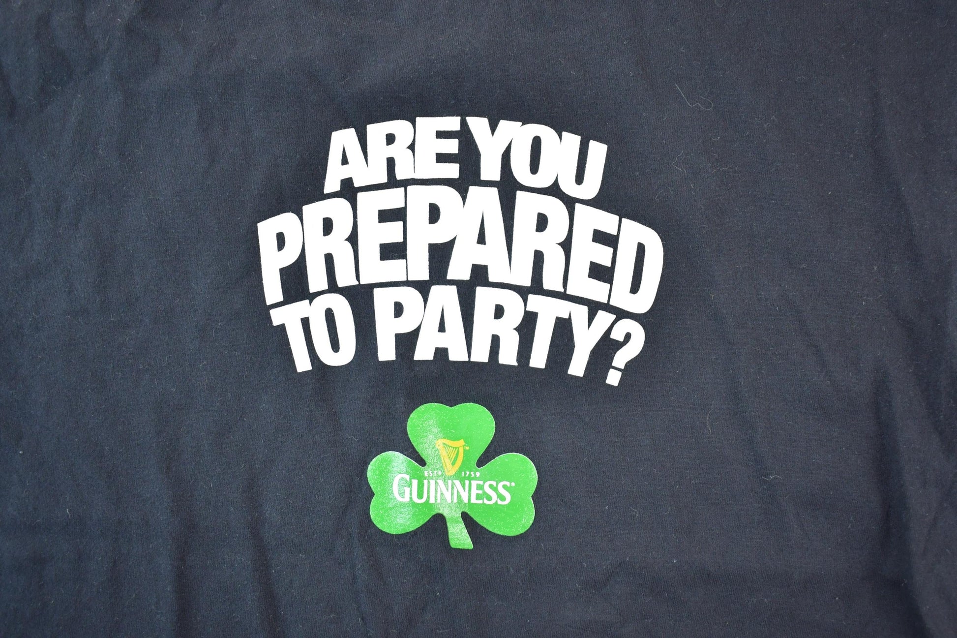 Vintage 1990s Guiness Prepared To Party Souvenir Single Stitch Graphic Print T-Shirt Made In USA Men's Large from propervintagecanada