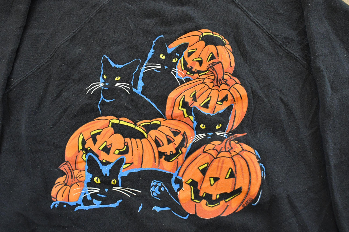 Vintage 1990s Halloween Pumpkin Raglan Crewneck Sweatshirt Men's M-L from propervintagecanada