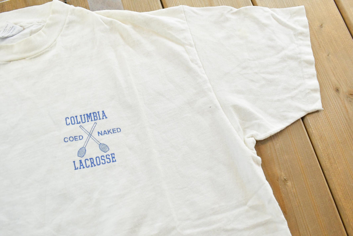Vintage 1990s Hanes Beefy Columbia Coed Naked Lacrosse T-Shirt Men's L from propervintagecanada