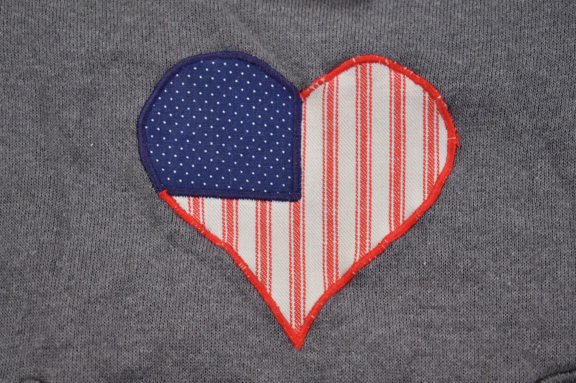 Vintage 1990s Hanes Embroidered USA Hearts Crewneck Sweater Men's XL from propervintagecanada