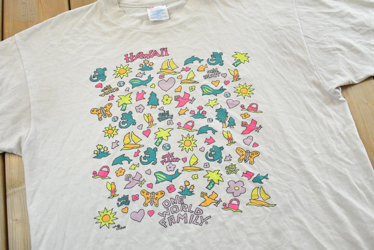 Vintage 1990s Hanes Hawaii Souvenir Graphic T-Shirt Men's L from propervintagecanada