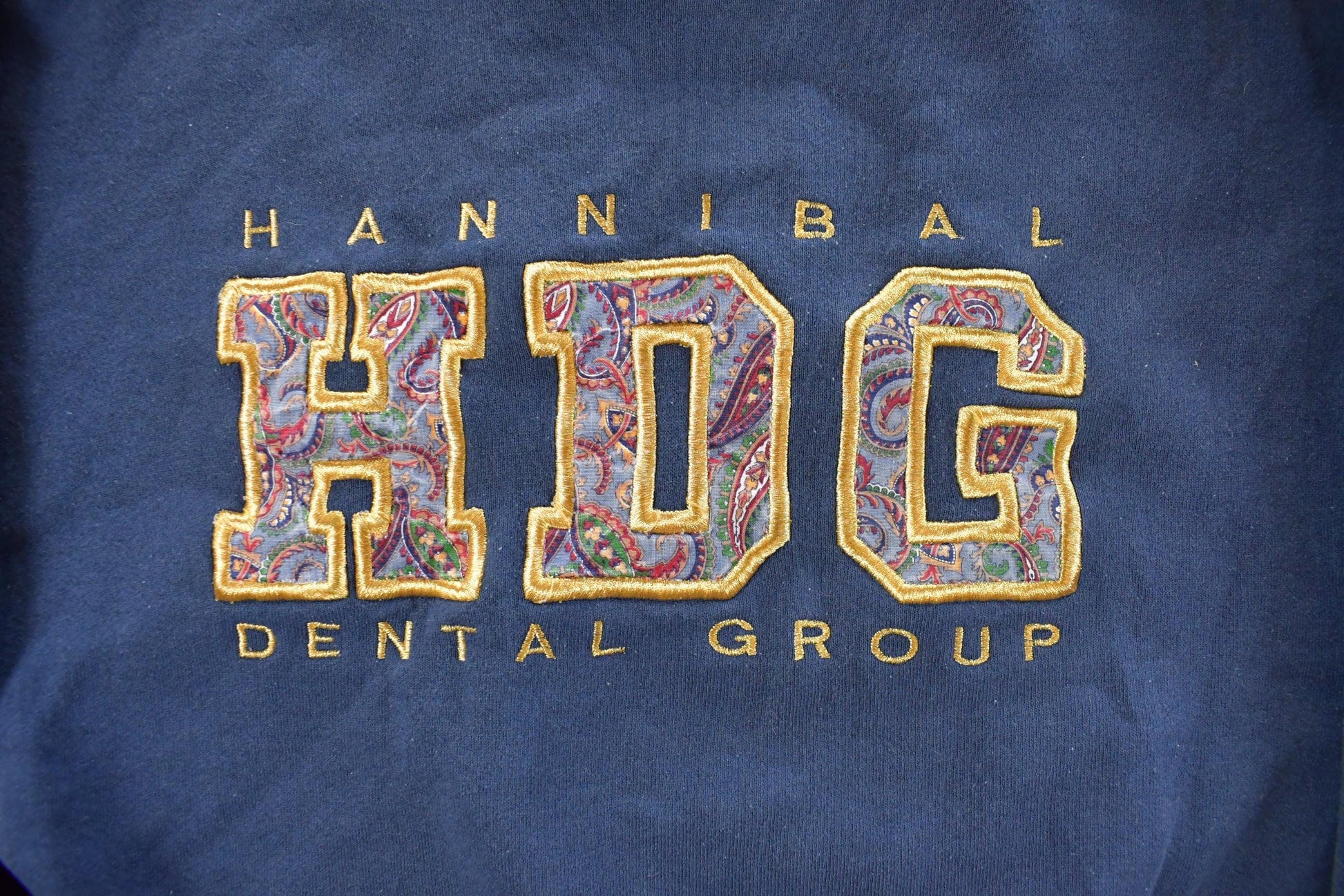 Vintage 1990s Hannibal Dental Group Paisley Crewneck Sweatshirt Men's Large from propervintagecanada