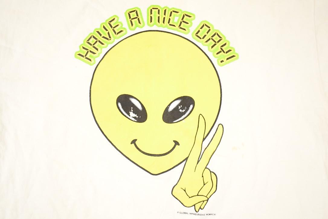 Vintage 1990s Have A Nice Day Alien Souvenir Travel T-Shirt Men's XL from propervintagecanada