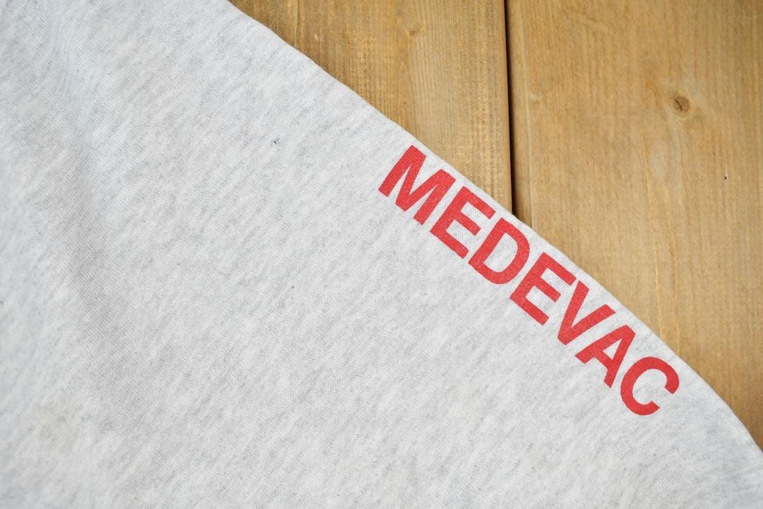 Vintage 1990s Helicopter Air Care Crewneck Sweatshirt Made In USA Men's XL from propervintagecanada