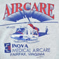 Vintage 1990s Helicopter Air Care Crewneck Sweatshirt Made In USA Men's XL from propervintagecanada