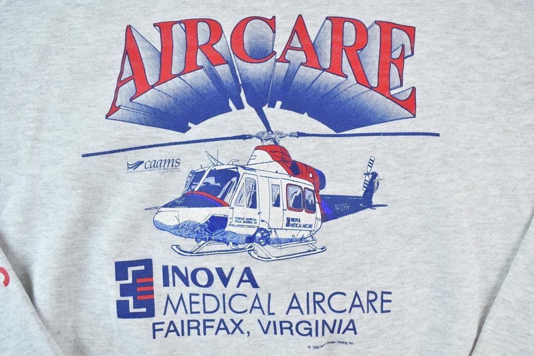 Vintage 1990s Helicopter Air Care Crewneck Sweatshirt Made In USA Men's XL from propervintagecanada