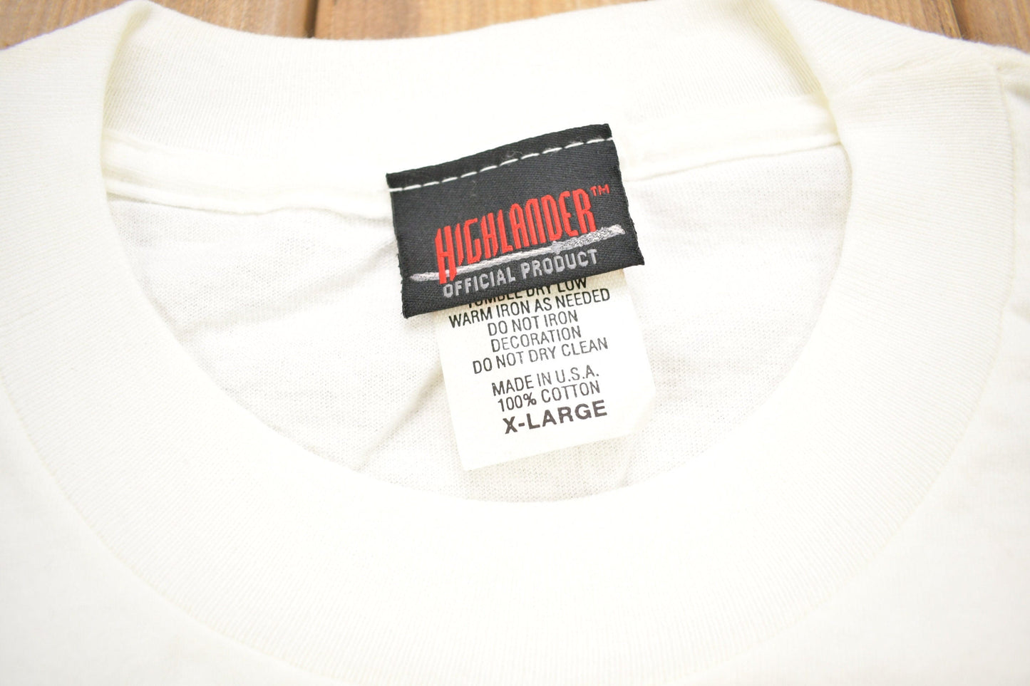 Vintage 1990s Highlander All Over Print Movie Promo T-shirt Men's XL from propervintagecanada