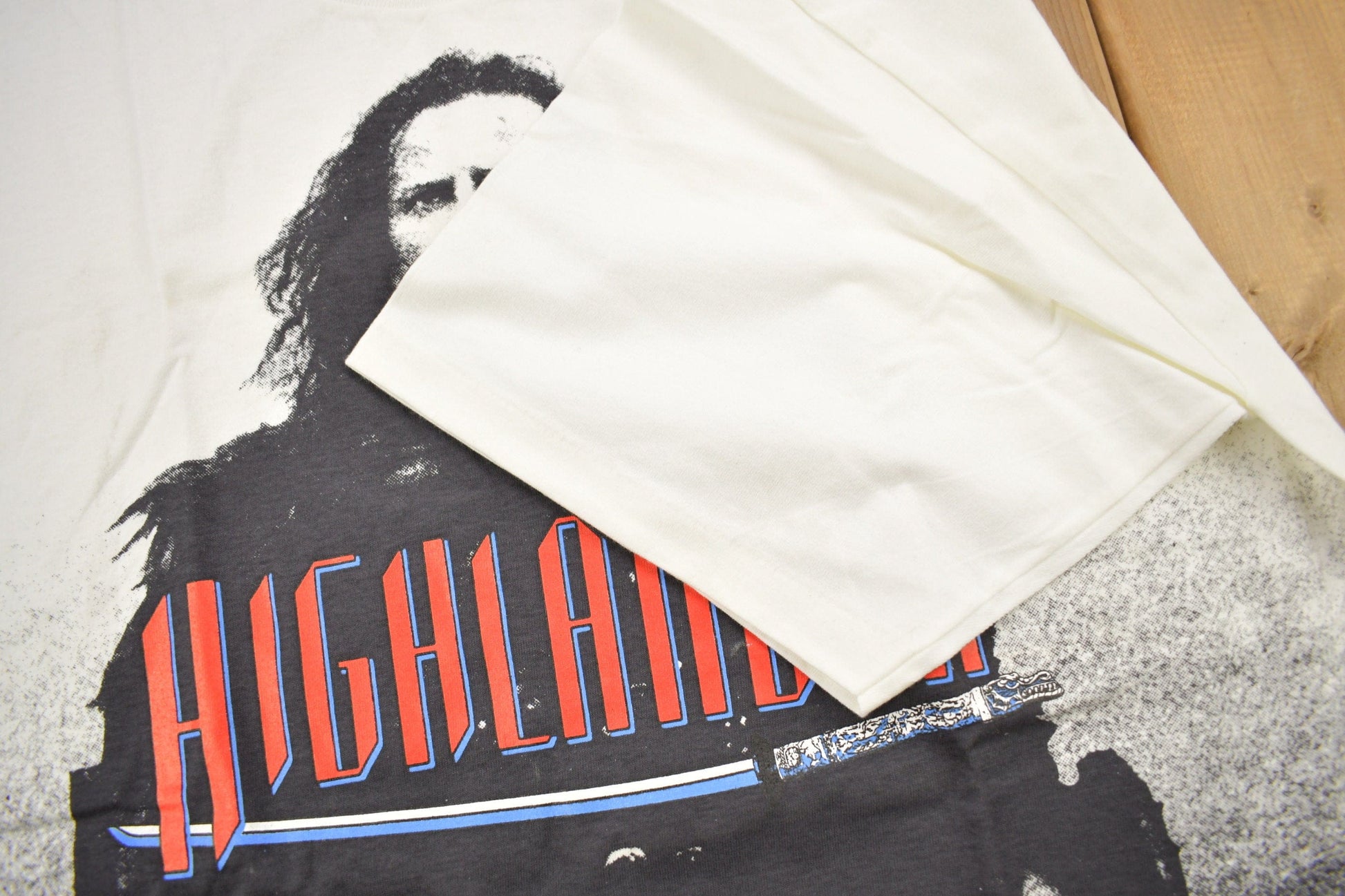 Vintage 1990s Highlander All Over Print Movie Promo T-shirt Men's XL from propervintagecanada