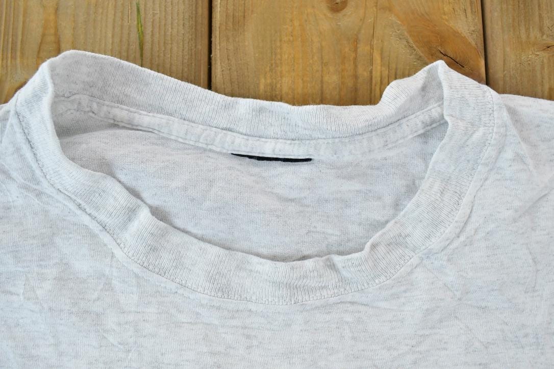 Vintage 1990s Hokies College Bird Single Stitch T-Shirt Men's Large from propervintagecanada