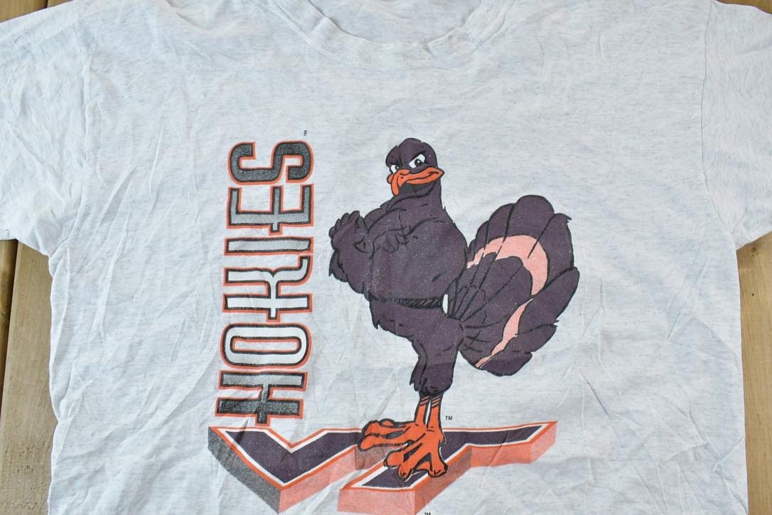 Vintage 1990s Hokies College Bird Single Stitch T-Shirt Men's Large from propervintagecanada