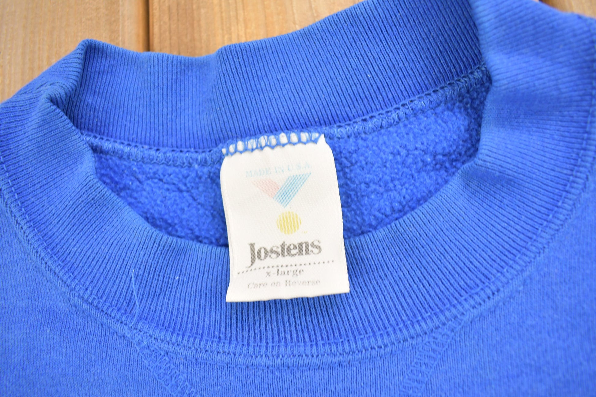 Vintage 1990s Hutchinson Blue Dragons Collegiate Crewneck Men's XL from propervintagecanada