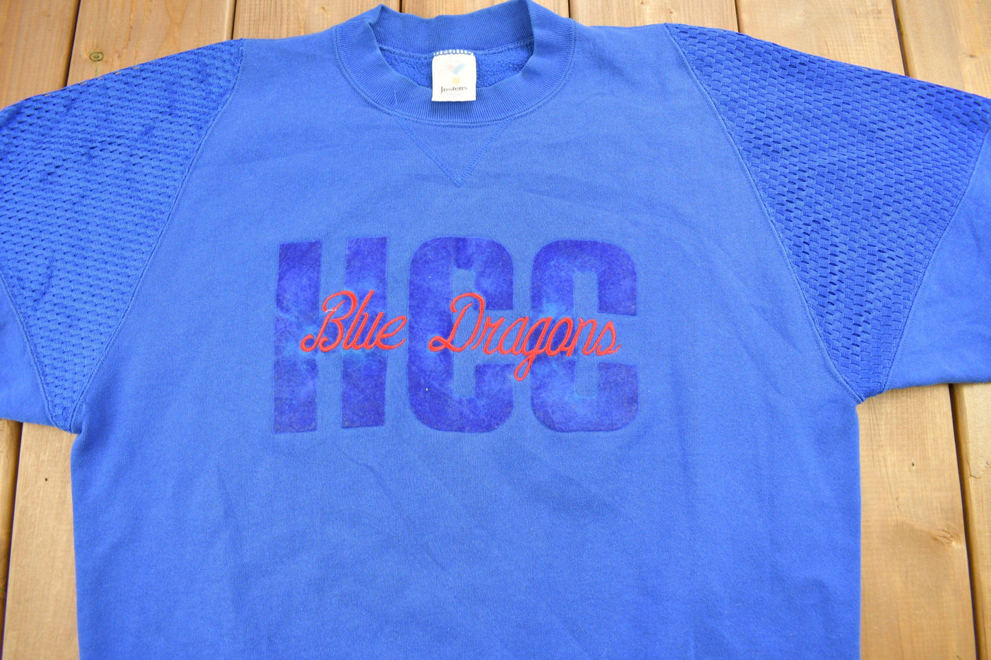 Vintage 1990s Hutchinson Blue Dragons Collegiate Crewneck Men's XL from propervintagecanada
