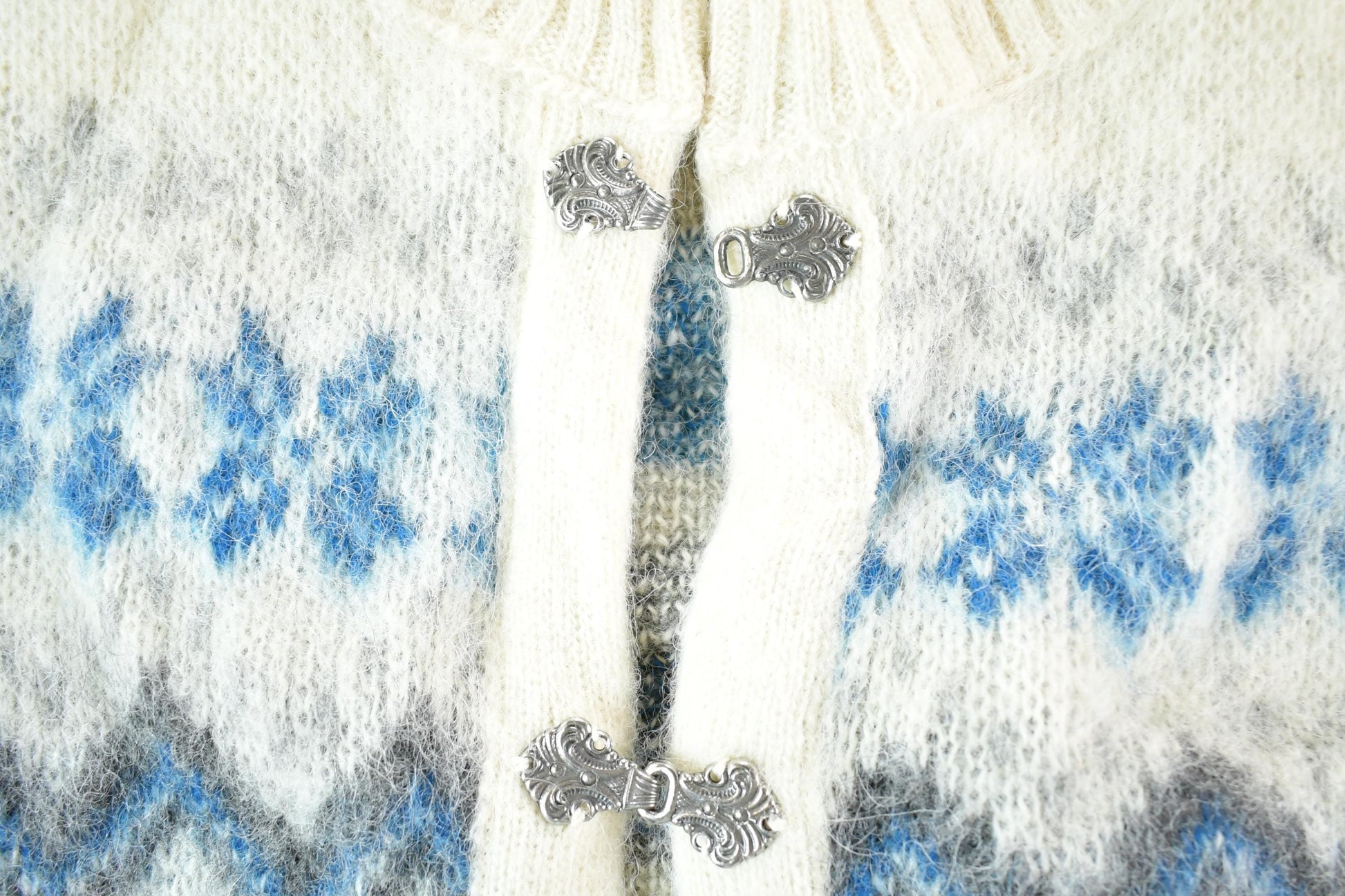 Vintage 1990s Ice Sheep Wool Knit Clasp Sweater Womens L from propervintagecanada