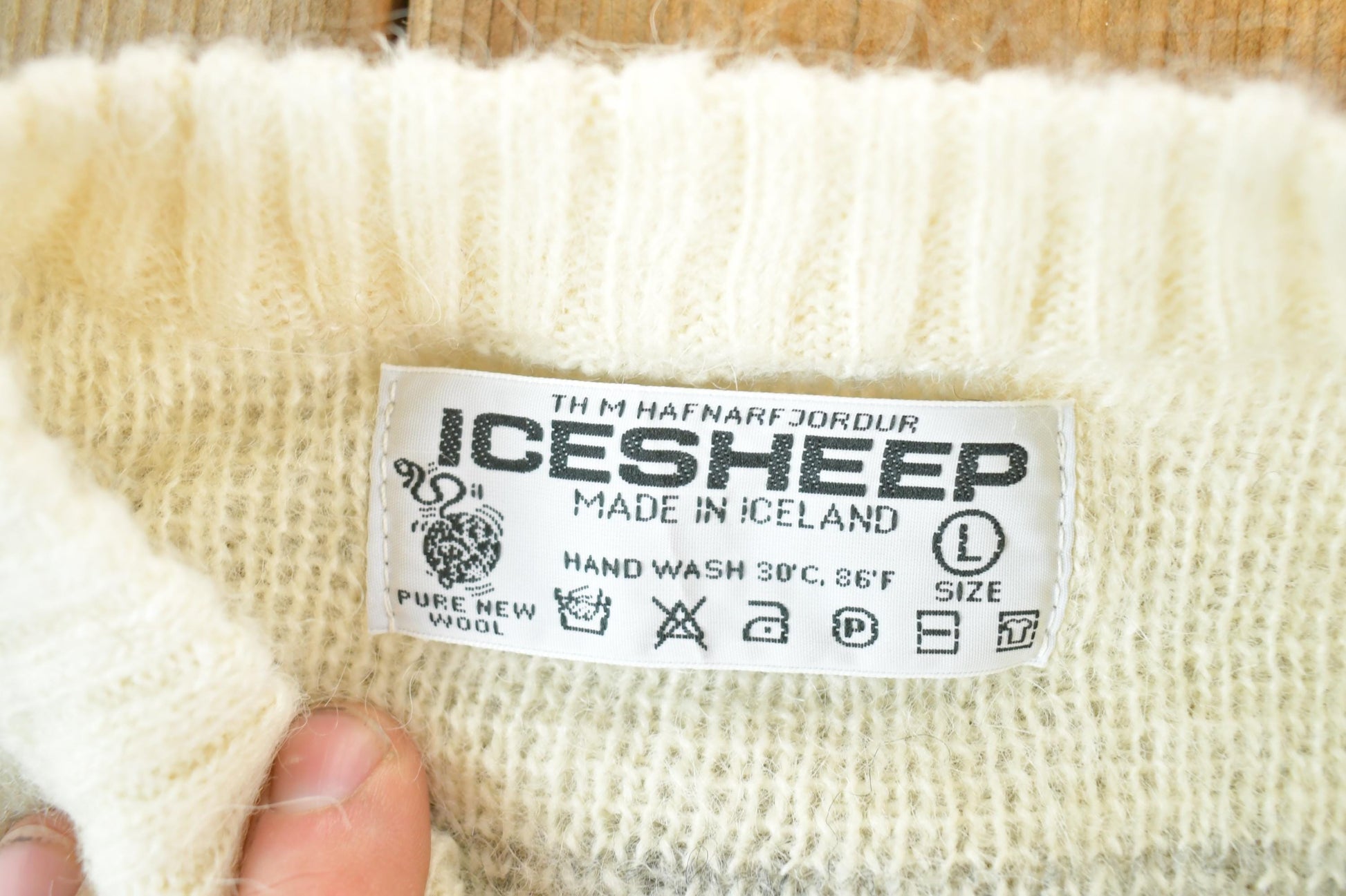 Vintage 1990s Ice Sheep Wool Knit Clasp Sweater Womens L from propervintagecanada