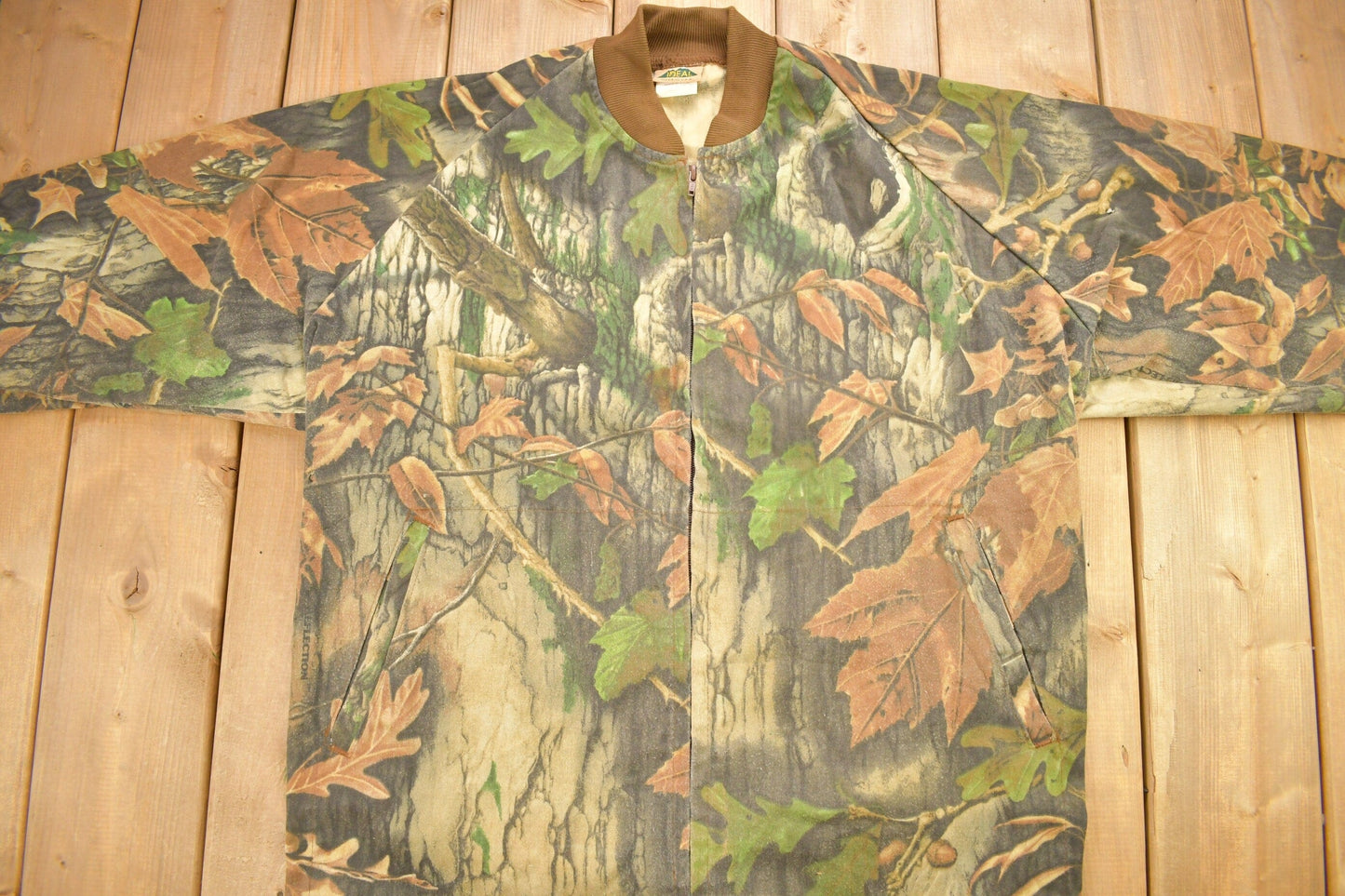 Vintage 1990s IDEAL Tree Camo Windbreaker Bomber Jacket Men's XL from propervintagecanada