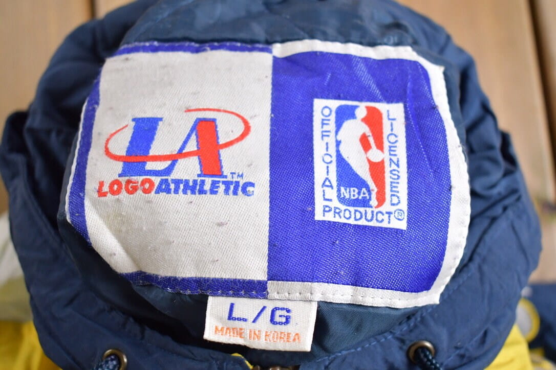 Vintage 1990s Indiana Pacers NBA Logo Athletic Shark Tooth Jacket from propervintagecanada