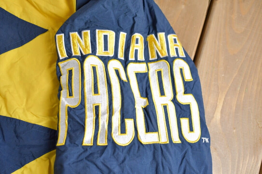 Vintage 1990s Indiana Pacers NBA Logo Athletic Shark Tooth Jacket from propervintagecanada