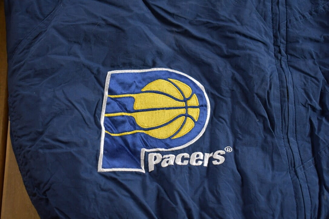 Vintage 1990s Indiana Pacers NBA Logo Athletic Shark Tooth Jacket from propervintagecanada