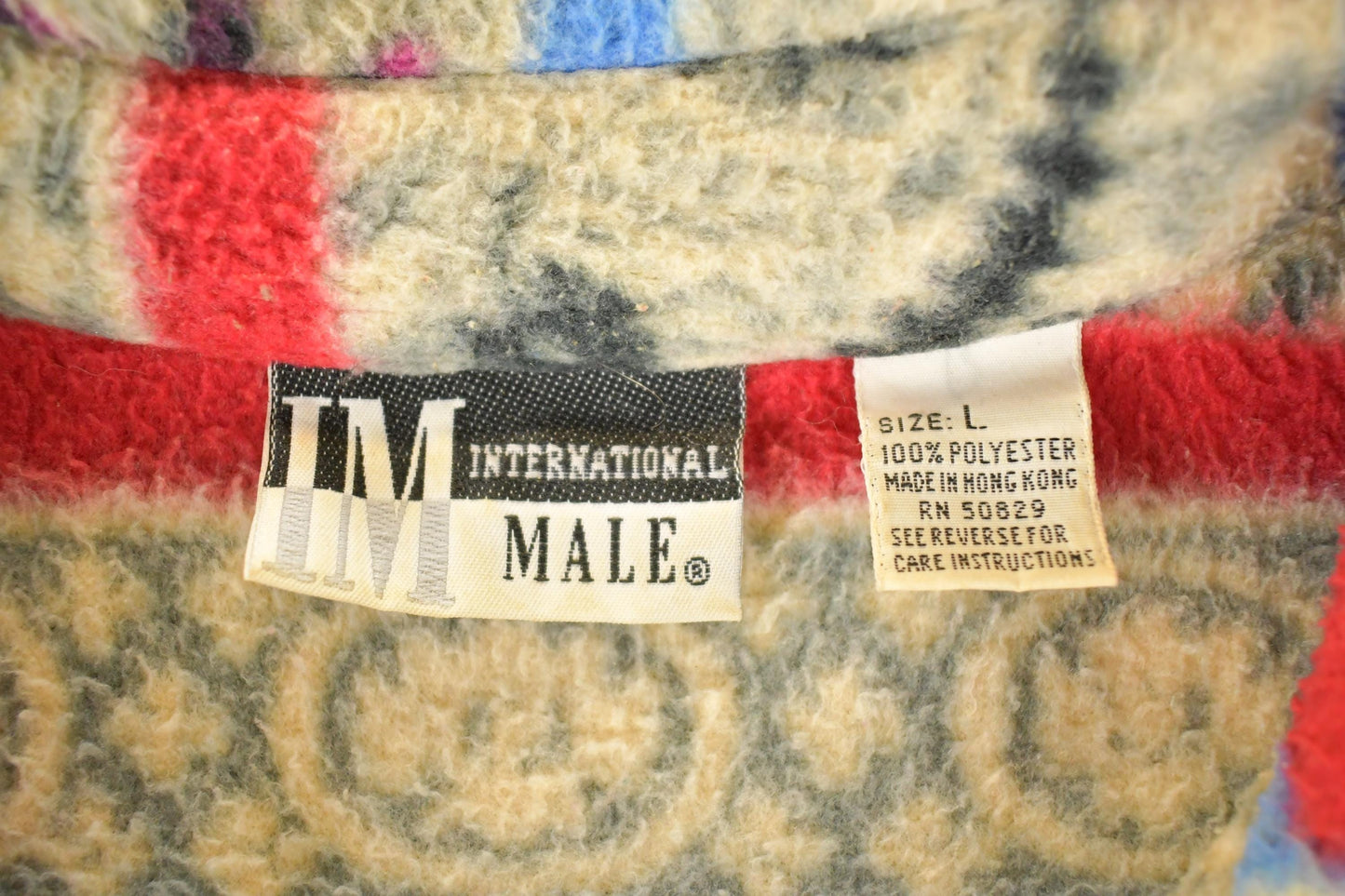 Vintage 1990s International Male Snowflake AOP Fleece Outdoorsman Sweater Men's XL from propervintagecanada