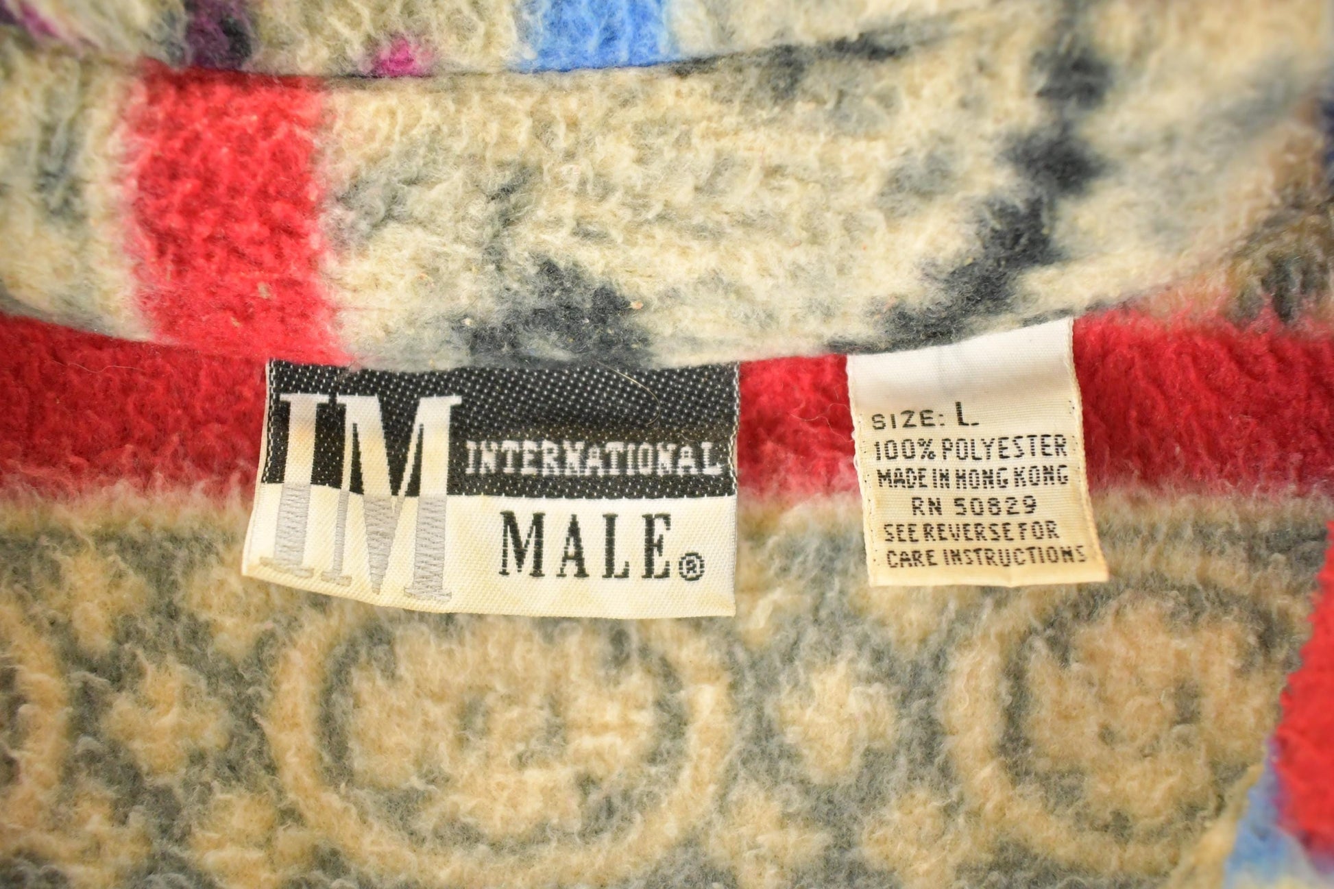 Vintage 1990s International Male Snowflake AOP Fleece Outdoorsman Sweater Men's XL from propervintagecanada