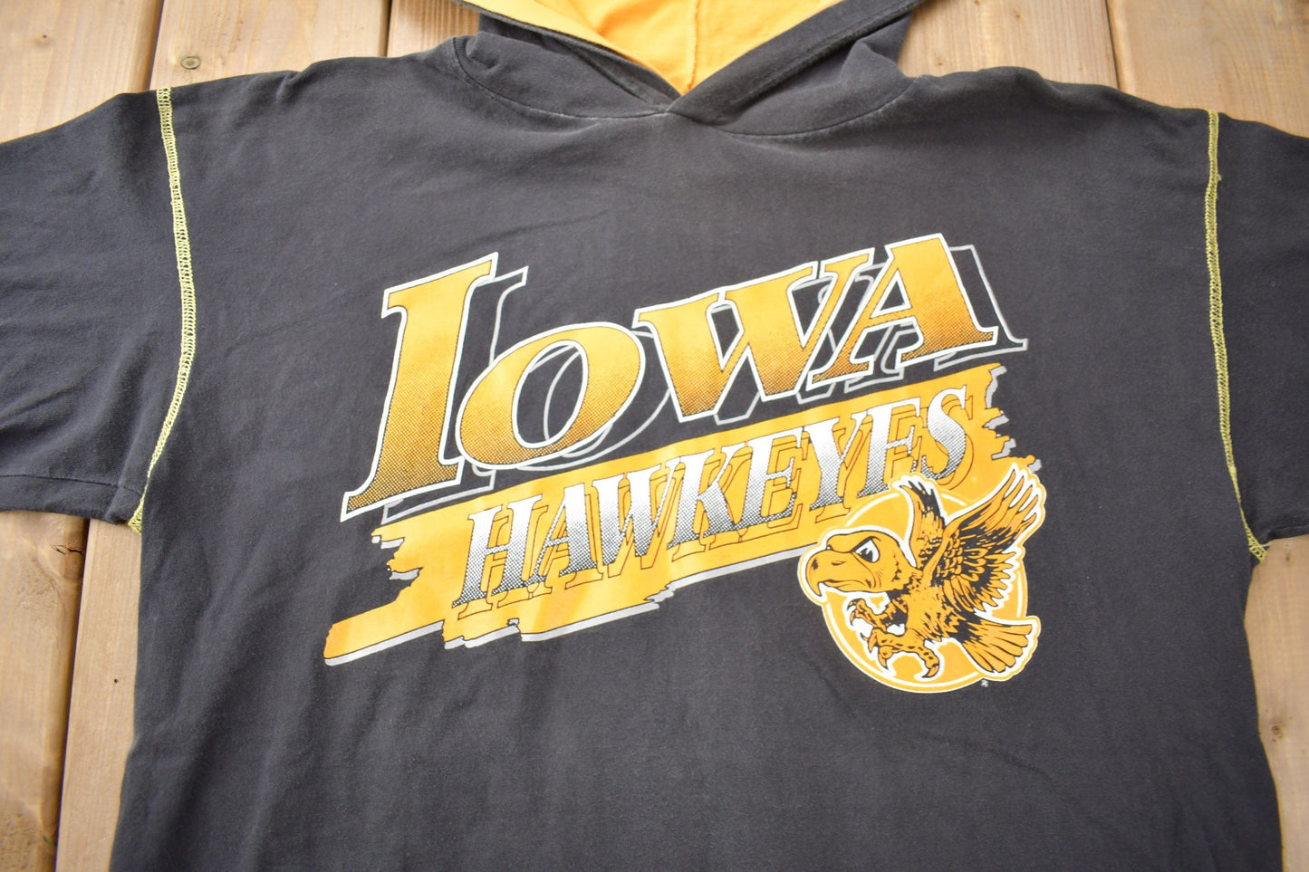 Vintage 1990s Iowa Hawkeyes Collegiate Hooded T-Shirt / NCAA Tee / Americana / Sportswear / The University Of Iowa from propervintagecanada