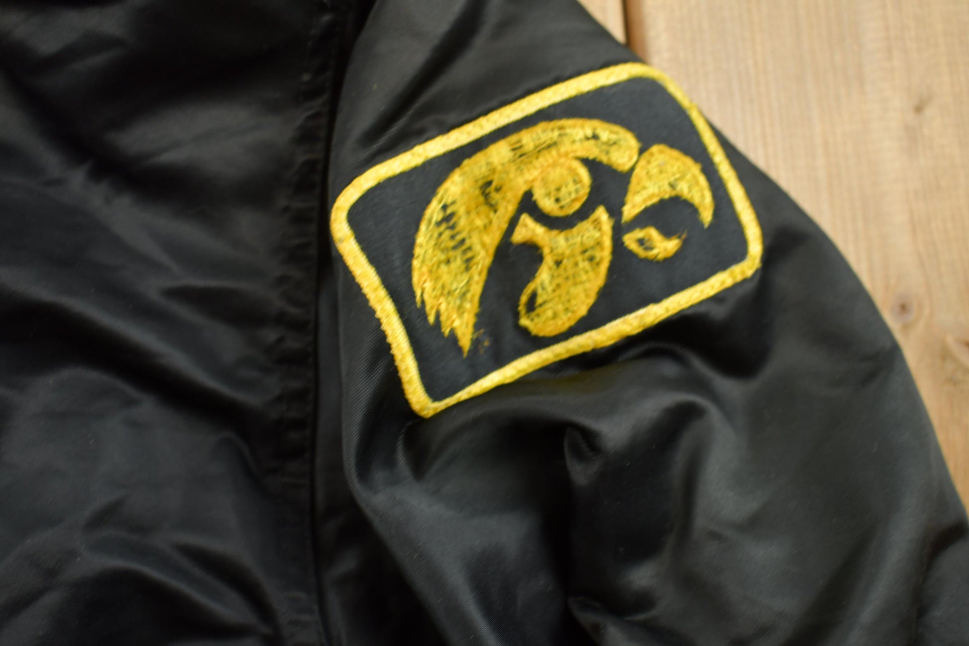 Vintage 1990s Iowa Hawkeyes NCAA Collegiate Satin Bomber Jacket Men's XL from propervintagecanada