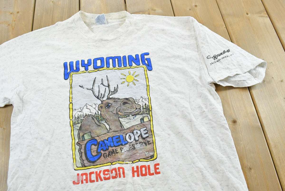 Vintage 1990s Jackson Hole Wyoming Camelope Definition Souvenir T-Shirt Mens M from propervintagecanada