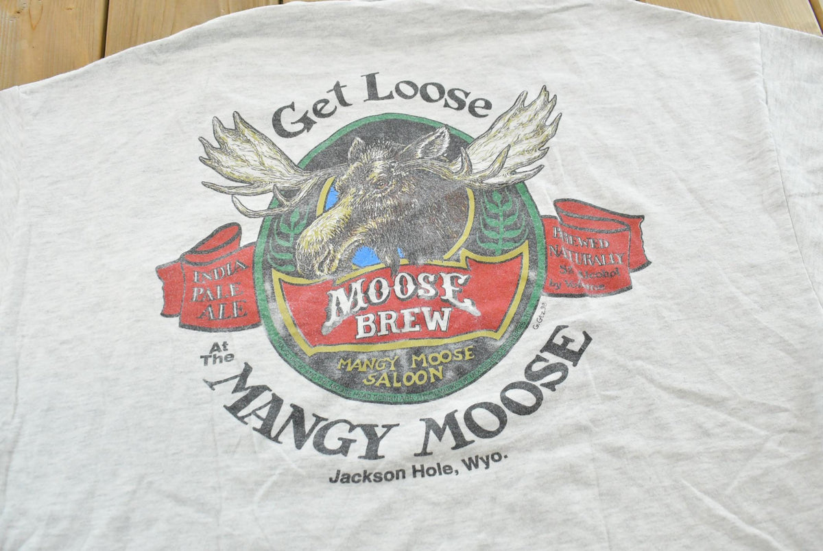 Vintage 1990s Jackson Hole Wyoming Mangy Moose Bar Souvenir Pocket T-Shirt Mens L Men's XL from propervintagecanada