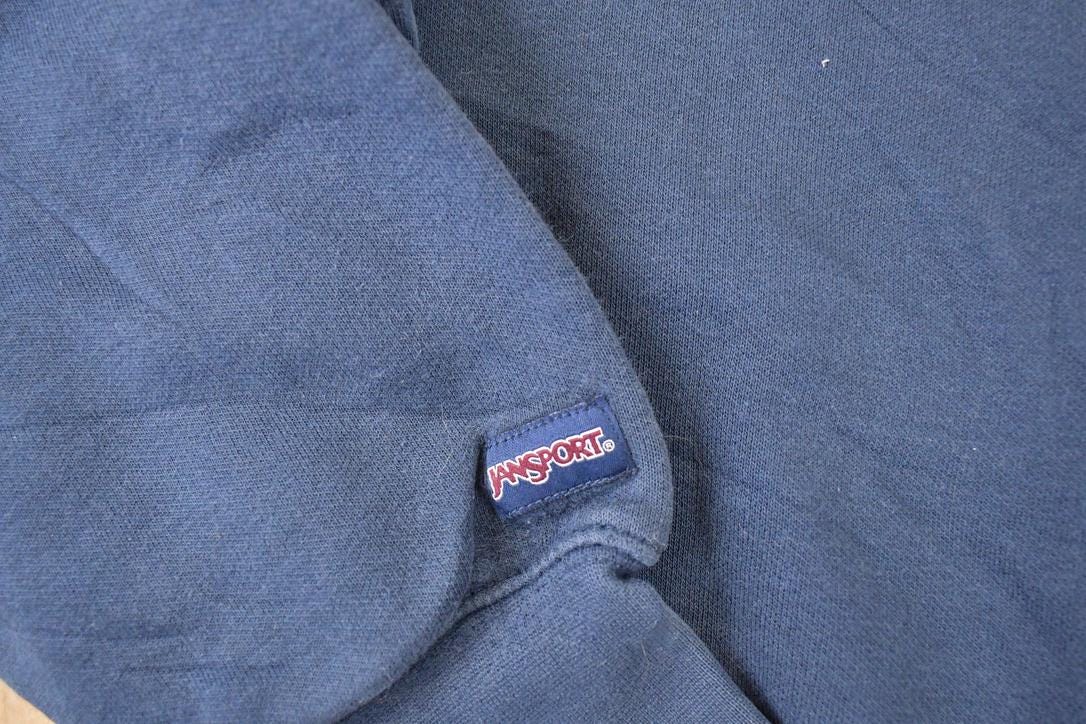 Vintage 1990s Jansport Bethel University Embroidered Crewneck Sweater Mens S from propervintagecanada