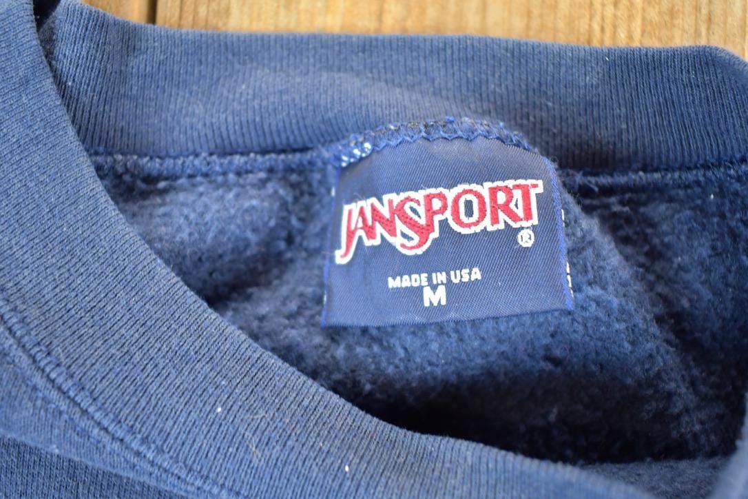 Vintage 1990s Jansport Moravian College Crewneck Sweatshirt Mens M from propervintagecanada