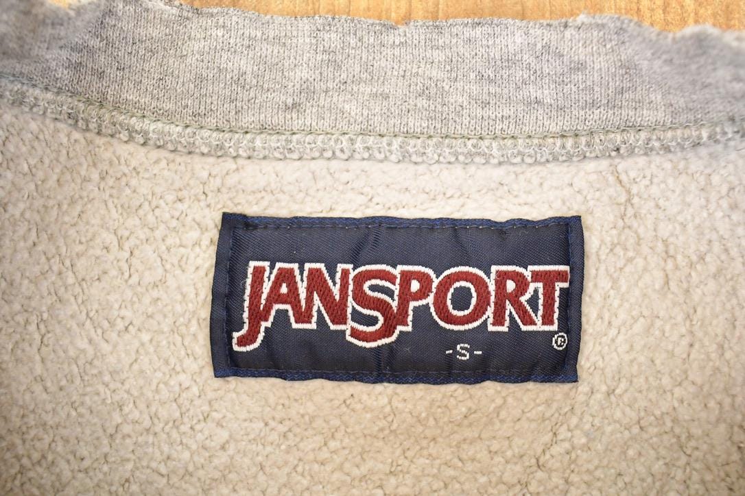 Vintage 1990s Jansport Southwest Athletic Club Crossgrain Crewneck Sweater Men's S from propervintagecanada