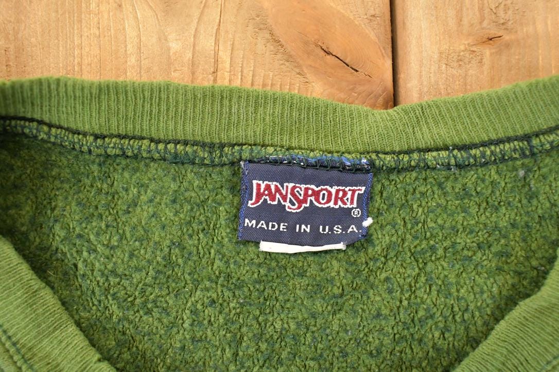 Vintage 1990s Jansport St John's University Crewneck Sweater Men's XL from propervintagecanada