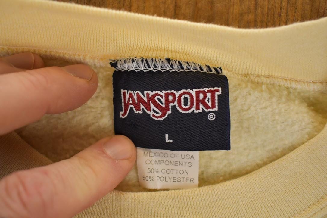 Vintage 1990s Jansport St Olaf Crewneck Sweatshirt Men's L from propervintagecanada