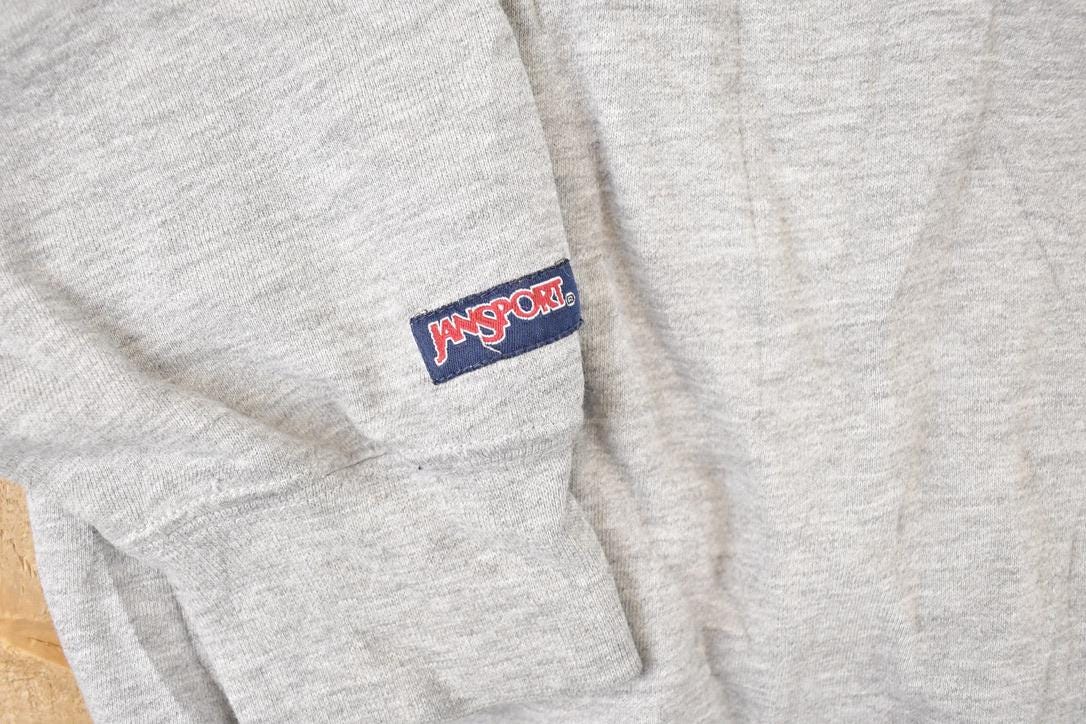 Vintage 1990s Jansport UAA Embroidered Collegiate Crewneck Sweatshirt Men's XL from propervintagecanada
