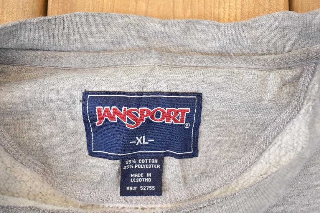 Vintage 1990s Jansport UAA Embroidered Collegiate Crewneck Sweatshirt Men's XL from propervintagecanada