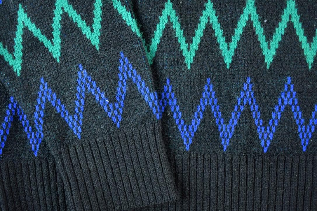 Vintage 1990s Jantzen Knit Abstract Pattern V Neck Sweater Men's Medium from propervintagecanada