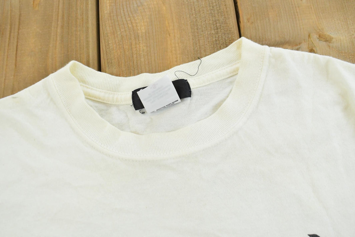 Vintage 1990s Japanese Surf Island Wave God Kanji T-Shirt Men's S from propervintagecanada