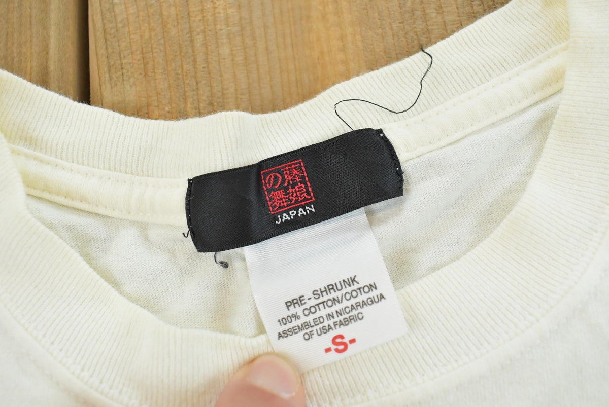 Vintage 1990s Japanese Surf Island Wave God Kanji T-Shirt Men's S from propervintagecanada