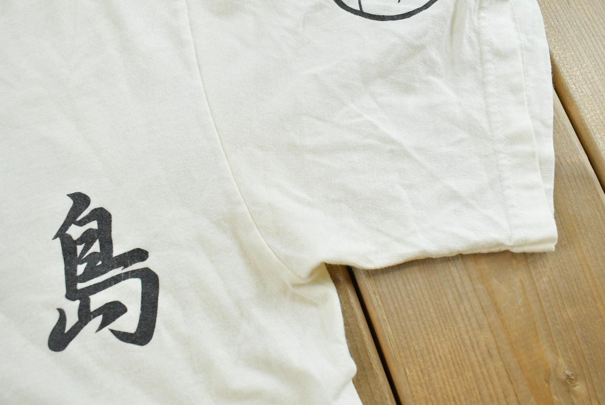 Vintage 1990s Japanese Surf Island Wave God Kanji T-Shirt Men's S from propervintagecanada